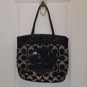 Coach Laura Signature Tote With Black and Gray Classic Design.